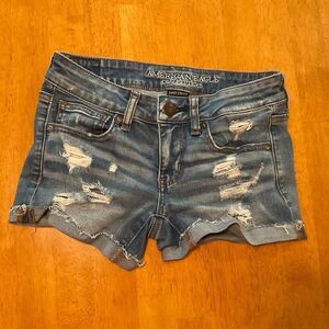 American Eagle distressed denim shorts medium wash size 2
